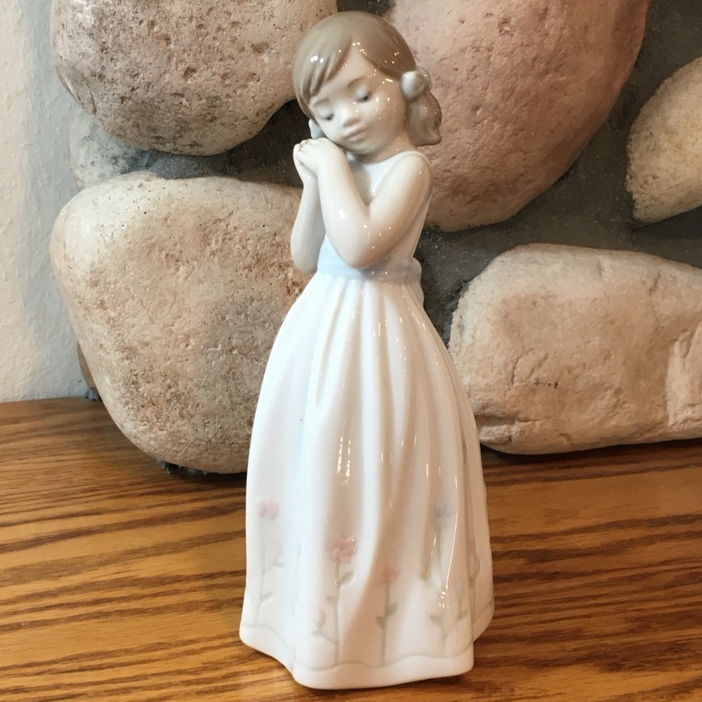 Lladro | Elegant Porcelain Girl Figurine with Floral Accents